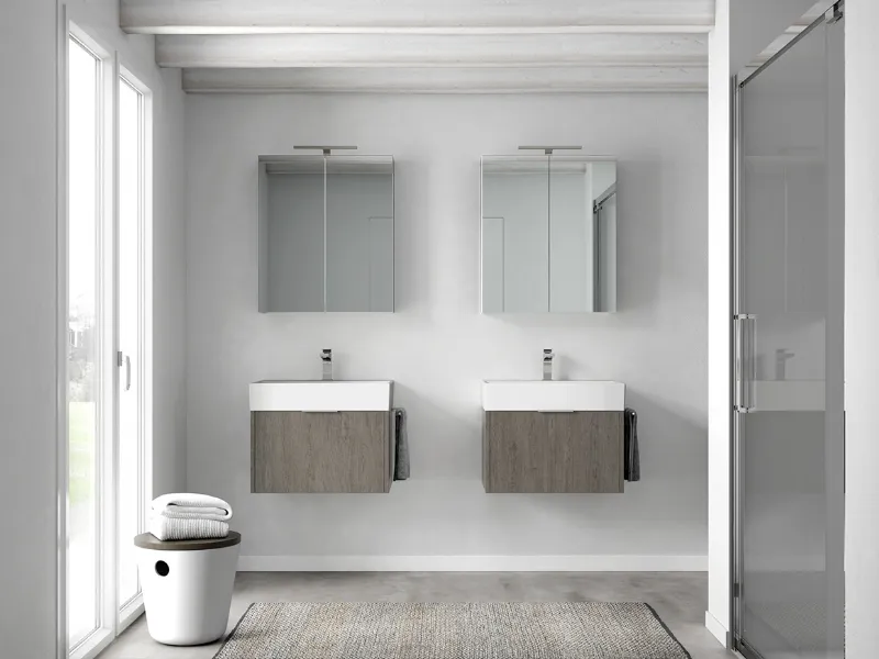 Piccoli ma contenitivi sono i mobili sottolavabo in nobilitato barrierato della collezione Basic by Blob di Ideagroup