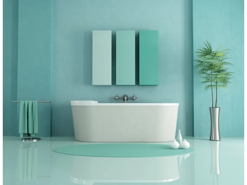 Il pavimento di questo bagno è ottenuto con Tinta Unika di Elekta Linea Resine