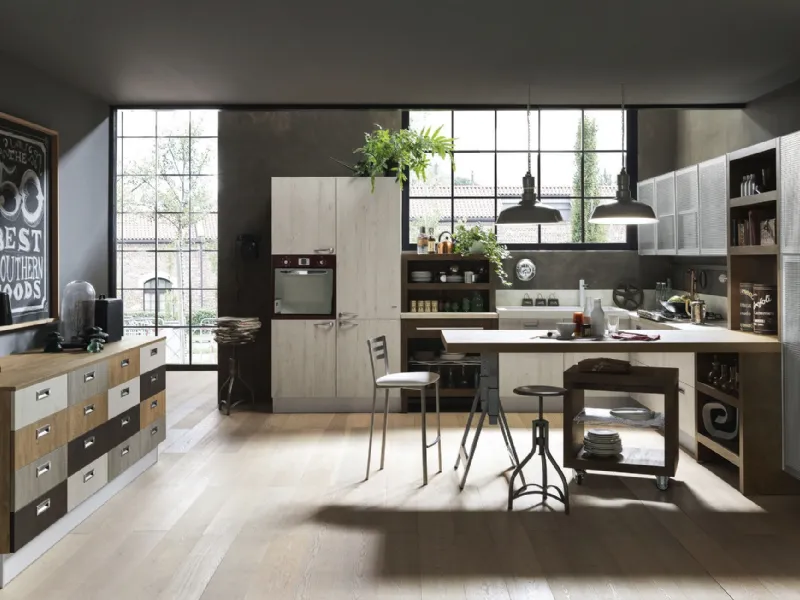 Febal Ice, Industrial edition: cucina dal design contemporaneo, con ampia e comoda penisola. Si può comporre con elementi ad altezza differenziata ed è disponibile in varie colorazioni.