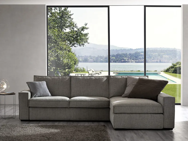 Divano angolare con chaise longue strutturato con letto matrimoniale a ribalta