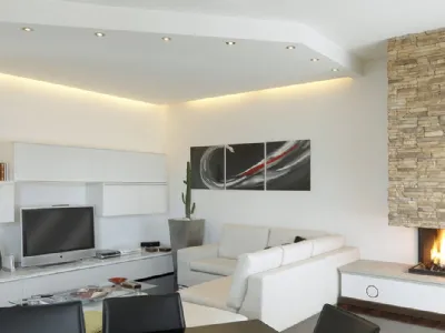 Un controsoffitto 3d disegna nuovi spazi nel living, nella proposta di cartongessoaroma.it
