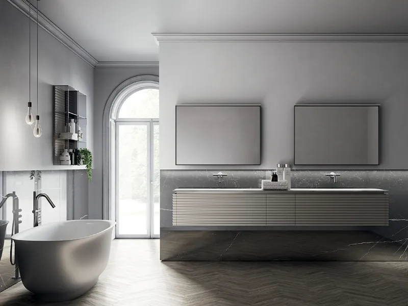 I volumi sofisticati e sinuosi della collezione d'arredo bagno Dolcevita di Ideagroup