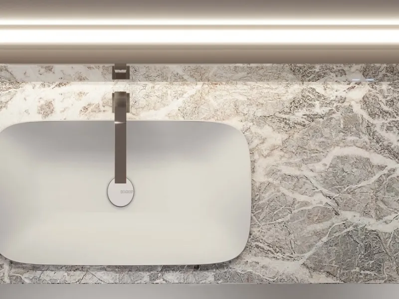 Ceramica bianca per il lavabo Alveo e piano in Marmo Fior di Pesco Carnico