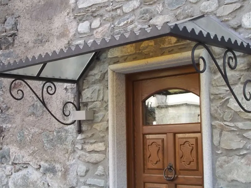 Pensilina in ferro battuto e vetro – Coltello del fabbro