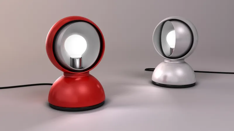 Lampade Artemide nei colori rosso ed argento