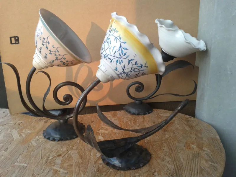 Appliques in ferro battuto e ceramica