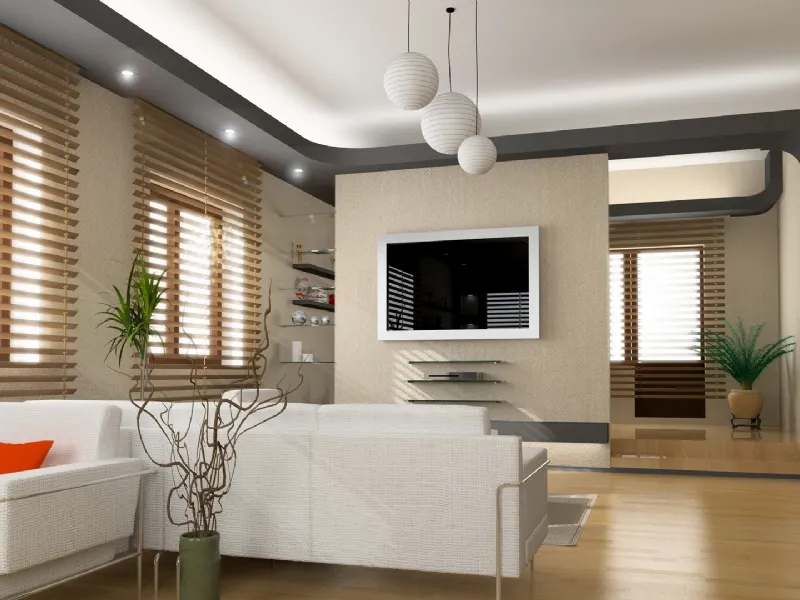 zona living con lampadari a sfere bianche, divani bianchi e parquet in legno chiaro, porta trasparente con grafiche bianche