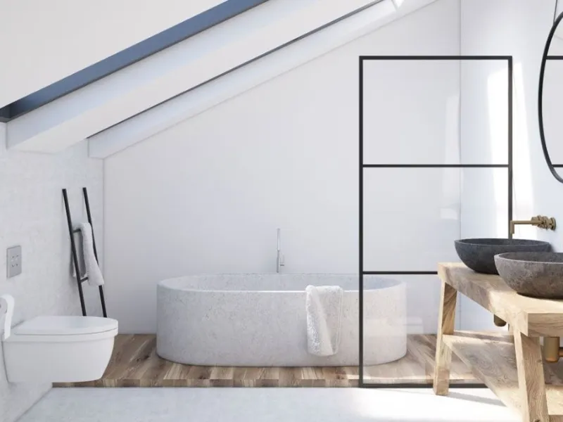 Bagno in mansarda con mobile rustico e due lavabi da appoggio