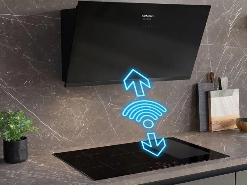Connessione automatica tra cappe inclinate e piani cottura a induzione serie IQ by Siemens