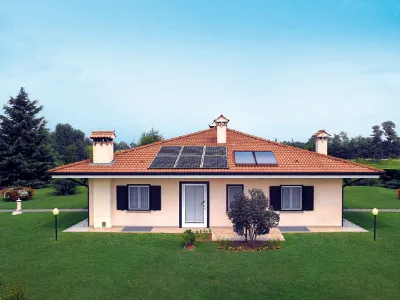 villetta familiare con sei pannelli fotovoltaici e due termici sul tetto 