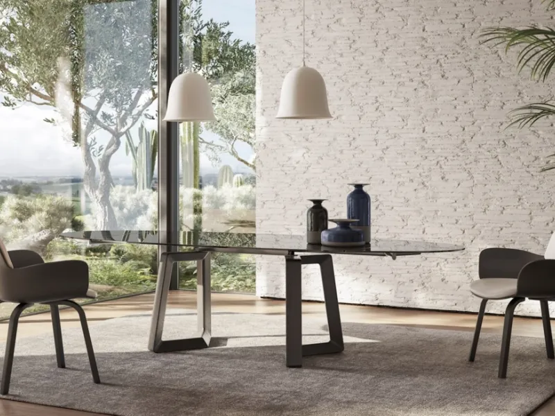 Tavolo allungabile ellittico in vetro modello Aliante di Natuzzi Italia