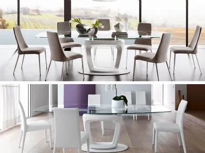 Due ambientazioni del tavolo Orbital di Calligaris, design Pininfarina