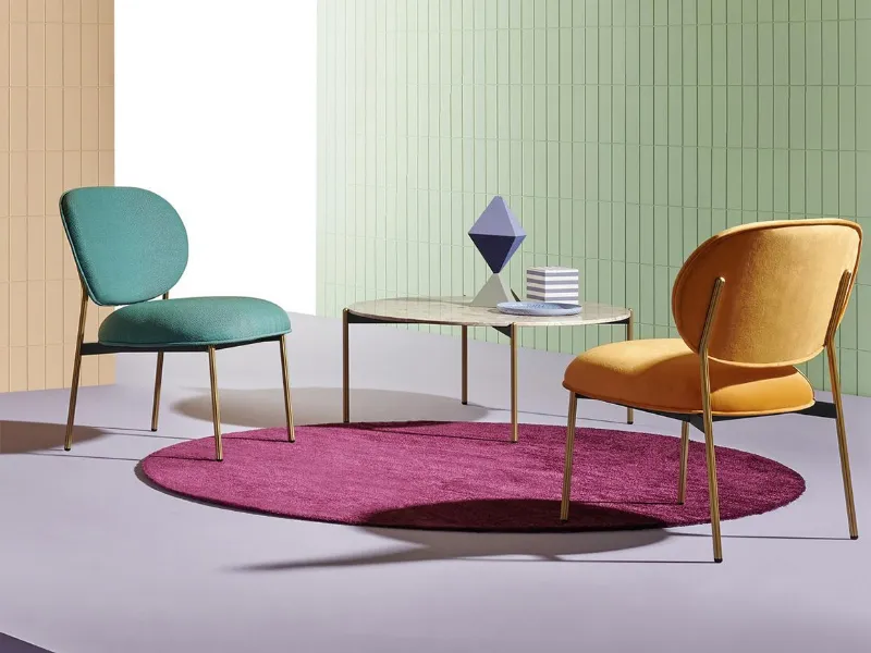 Colorata e con una silhouette floreale Blume è la nuova sedia di Predali